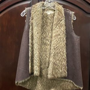 Brown leather and furry vest